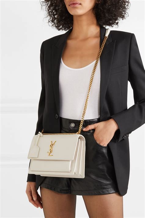 ysl white fluffy bag|where are ysl bag stores.